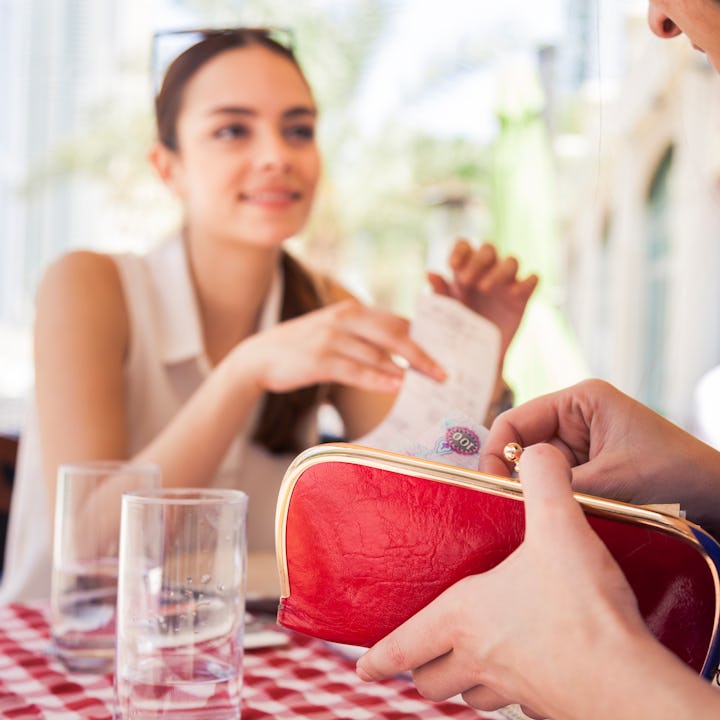 Two women at lunch. One has a wallet. A woman just took to Reddit's AITA to ask if she was the jerk ...