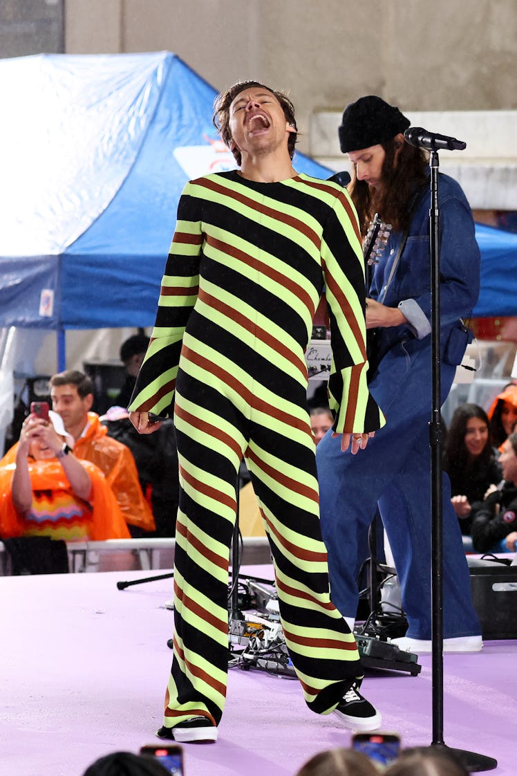 Harry Styles' Style Evolution: his neon, striped jumpsuit to perform on NBC's "Today" at Rockefeller...