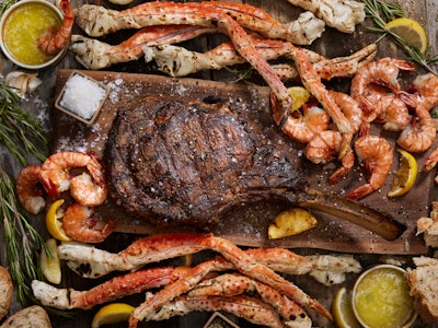 Tomahawk Steak with King Crab Legs and Tiger Prawns
