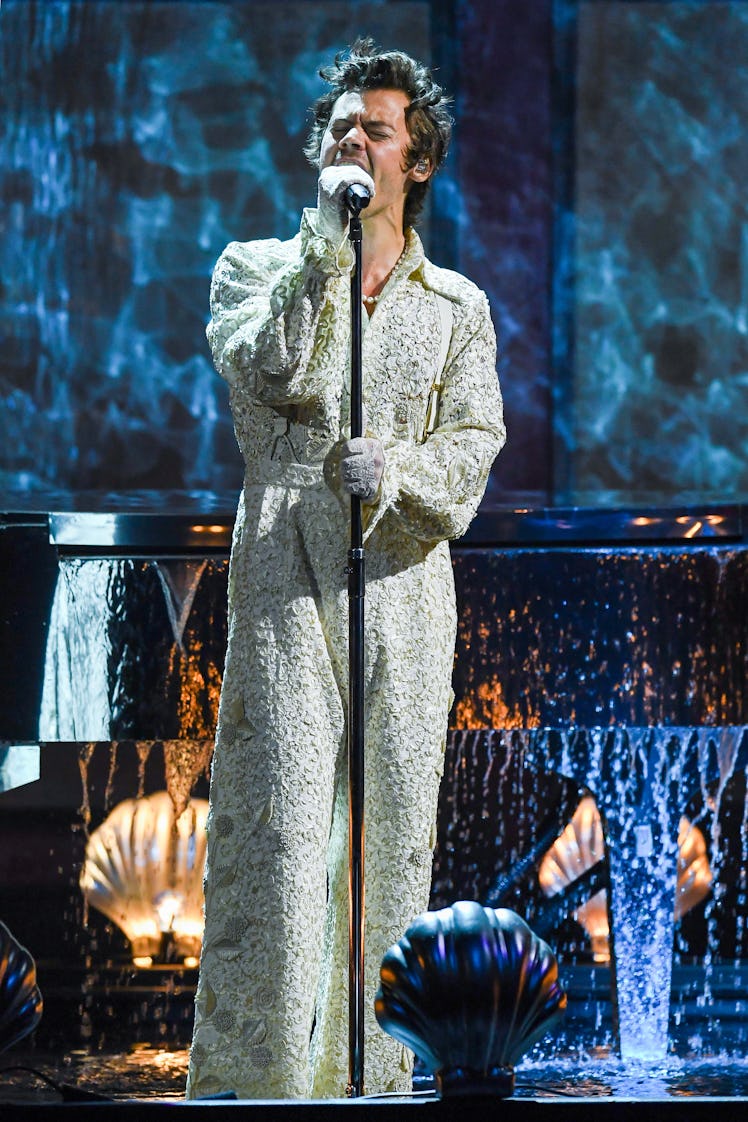 Harry Styles Style Evolution: his sequined jumpsuit from The BRIT Awards 2020 at The O2 Arena on Feb...