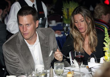 (051909 Boston, MA) Gisele Bundchen steals some of Tom Brady's dessert as he visits during the Cha...
