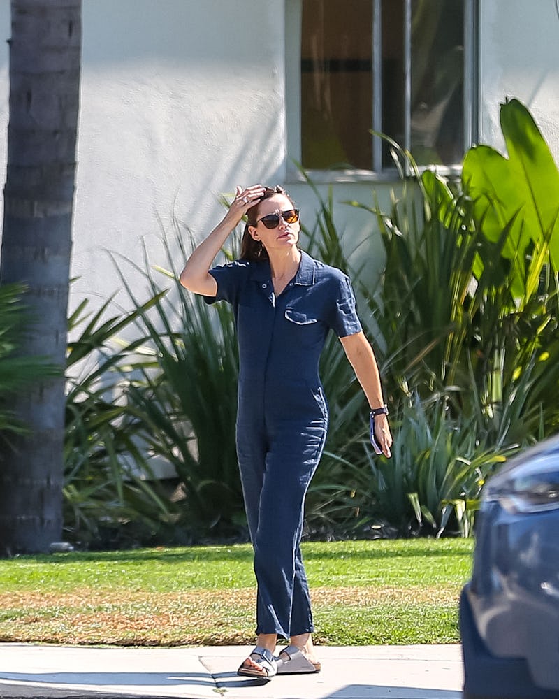 Jennifer Garner wearing a navy jumpsuit