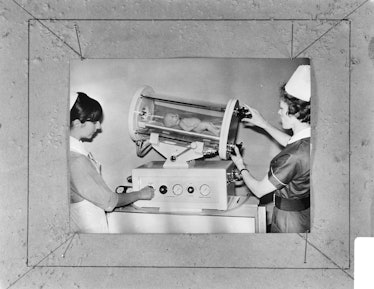 This 1966 photo shows an old incubator for new babies