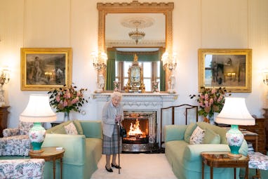 ABERDEEN, SCOTLAND - SEPTEMBER 06: Queen Elizabeth II waits in the Drawing Room before receiving new...
