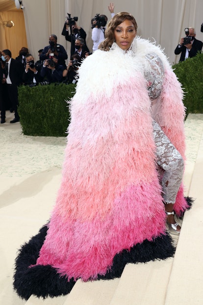 Serena Williams wears a feathered cape to the 2021 Met Gala.