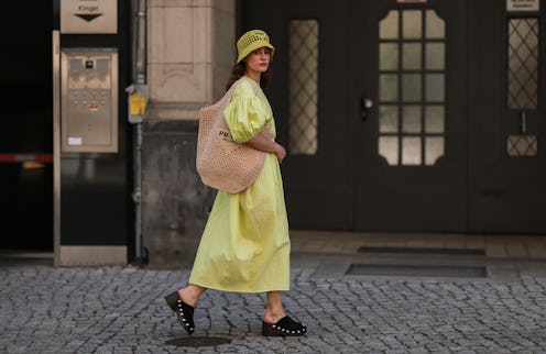 BERLIN, GERMANY - AUGUST 14: Lea Naumann seen wearing Cecilie Bahnsen neon yellow green long dress w...