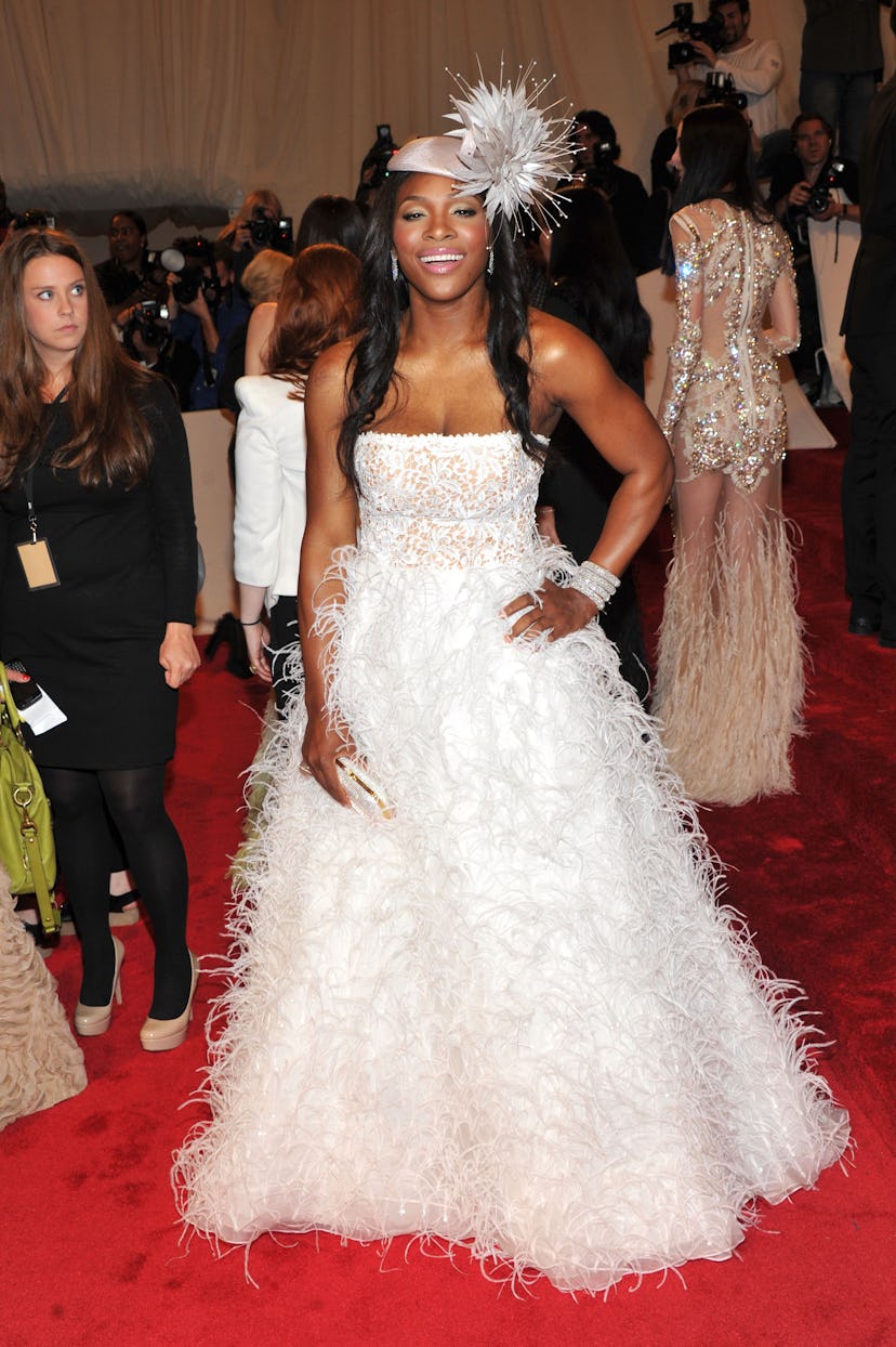 Serena Williams the 2011 Met Gala in a white feathered gown.