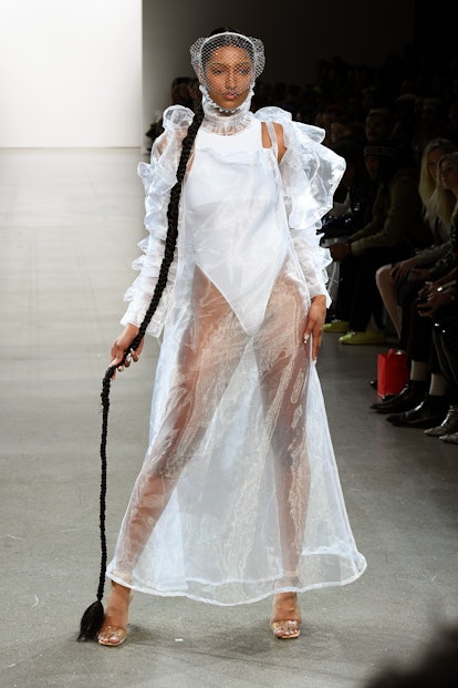 NEW YORK, NEW YORK - FEBRUARY 07: A model walks the runway for Tia Adeola fashion show during Februa...