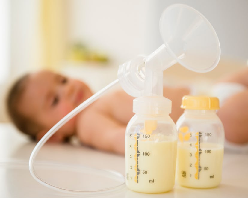 a photo of pumped breast milk in bottles in an article about relactation