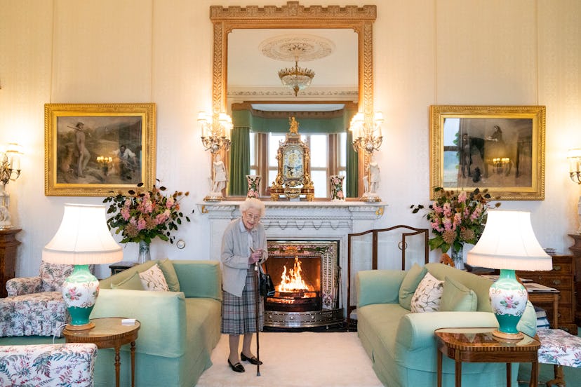 ABERDEEN, SCOTLAND - SEPTEMBER 06: Queen Elizabeth II waits in the Drawing Room before receiving new...