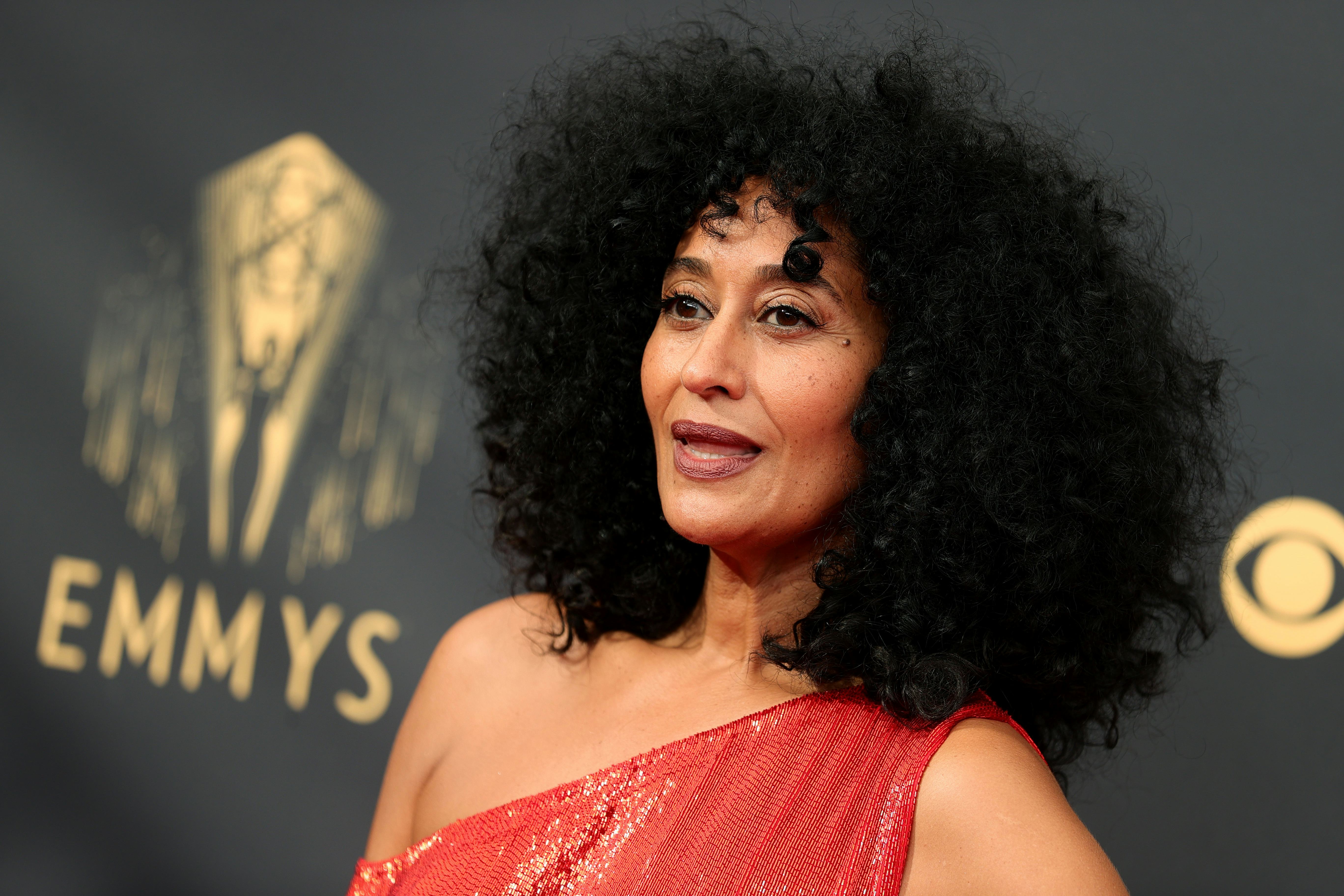 Tracee Ellis Ross rocks a curly shag haircut to the 73rd Primetime Emmy Awards in 2021.