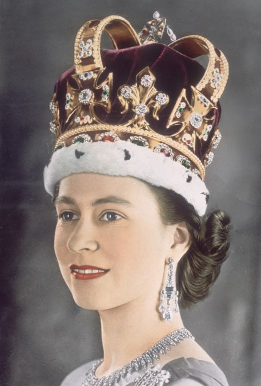Queen Elizabeth II in her coronation crown, 1953. Known as St Edward's Crown, it was made in 1661 fo...