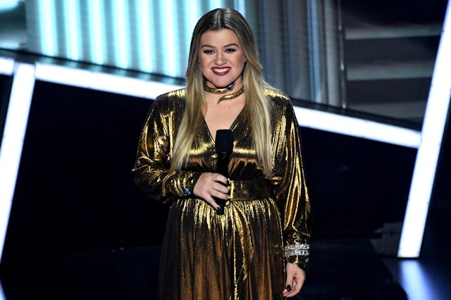 Kelly Clarkson speaks onstage at the 2020 Billboard Music Awards. She explained recently that she pu...