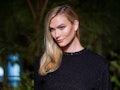Karlie Kloss' pumpkin spice makeup is different from the makeup she wore to attend the Chanel Dinner...