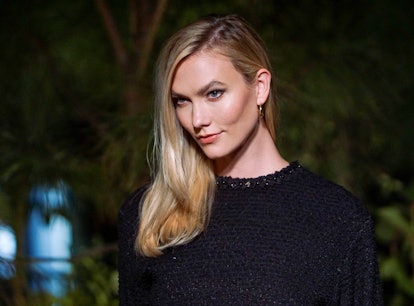 Karlie Kloss' pumpkin spice makeup is different from the makeup she wore to attend the Chanel Dinner...