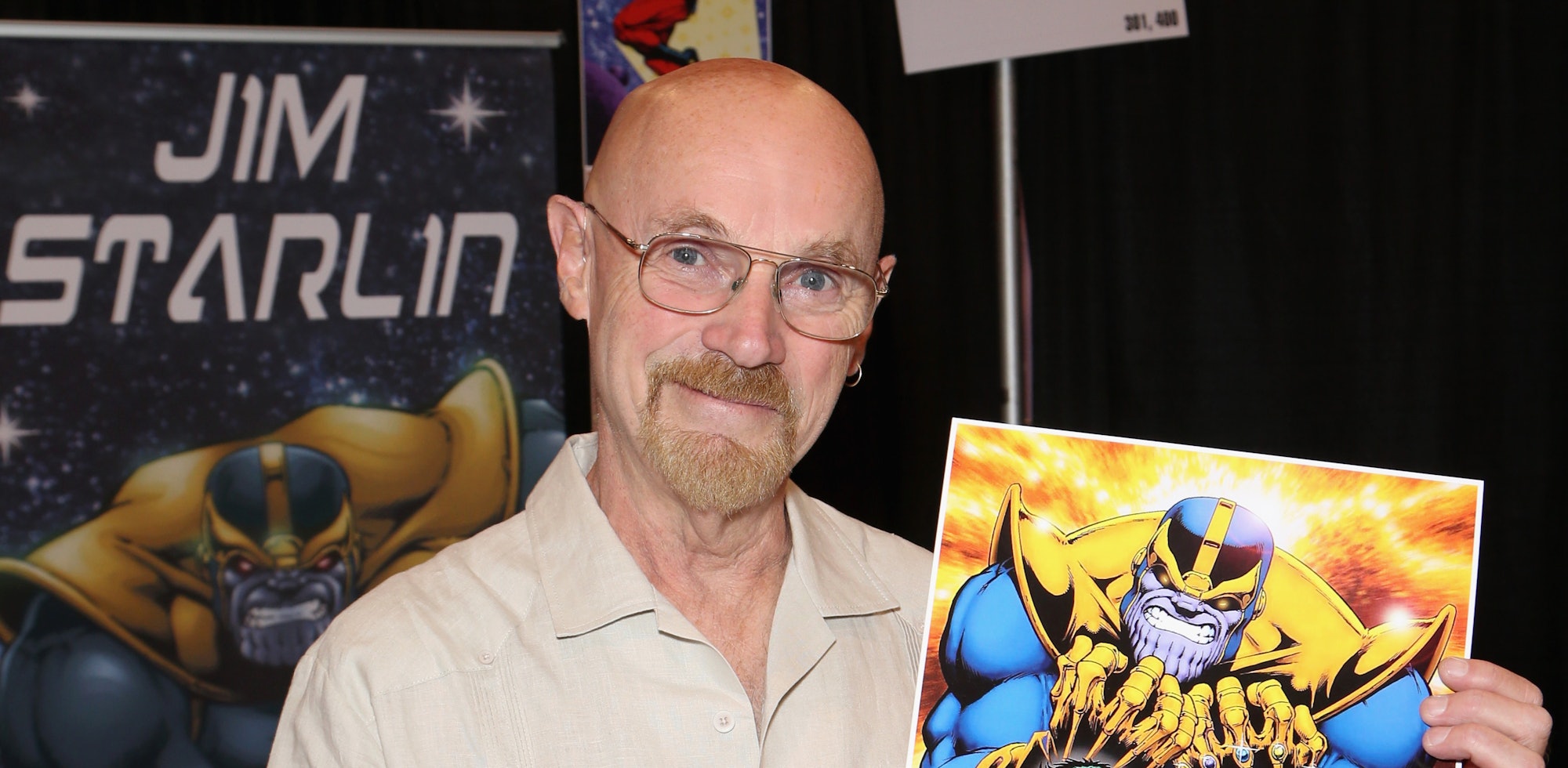 LAS VEGAS, NV - JULY 01:   Artist/writer Jim Starlin holds up his artwork of the character Thanos fr...