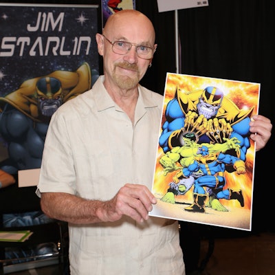 LAS VEGAS, NV - JULY 01:   Artist/writer Jim Starlin holds up his artwork of the character Thanos fr...
