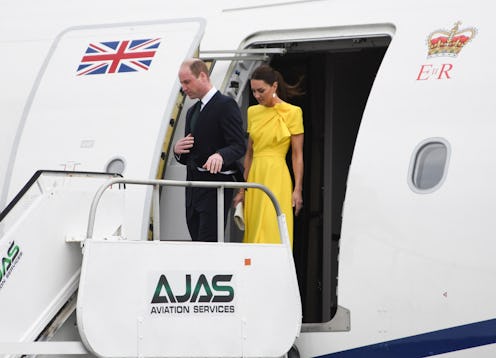 Prince William, Duke of Cambridge and his wife Catherine, Duchess of Cambridge step off the plane up...