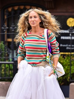 Sarah Jessica Parker carrying a purple sequin Baguette bag.