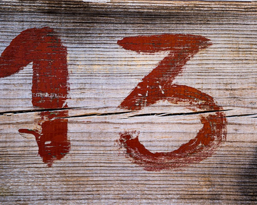 Number 13 written on wooden