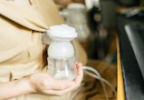 Pumping breast milk while pregnant.