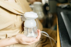Pumping breast milk while pregnant.