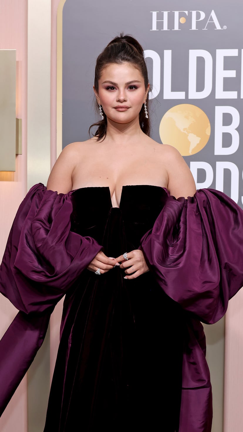 Selena Gomez wearing a purple Valentino gown at the 2023 Golden Globes.