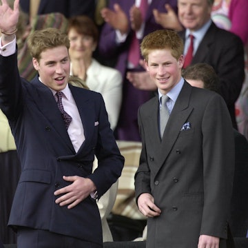 Prince Harry and Prince William arrive to take their seats in the Royal Box in the gardens of Buckin...