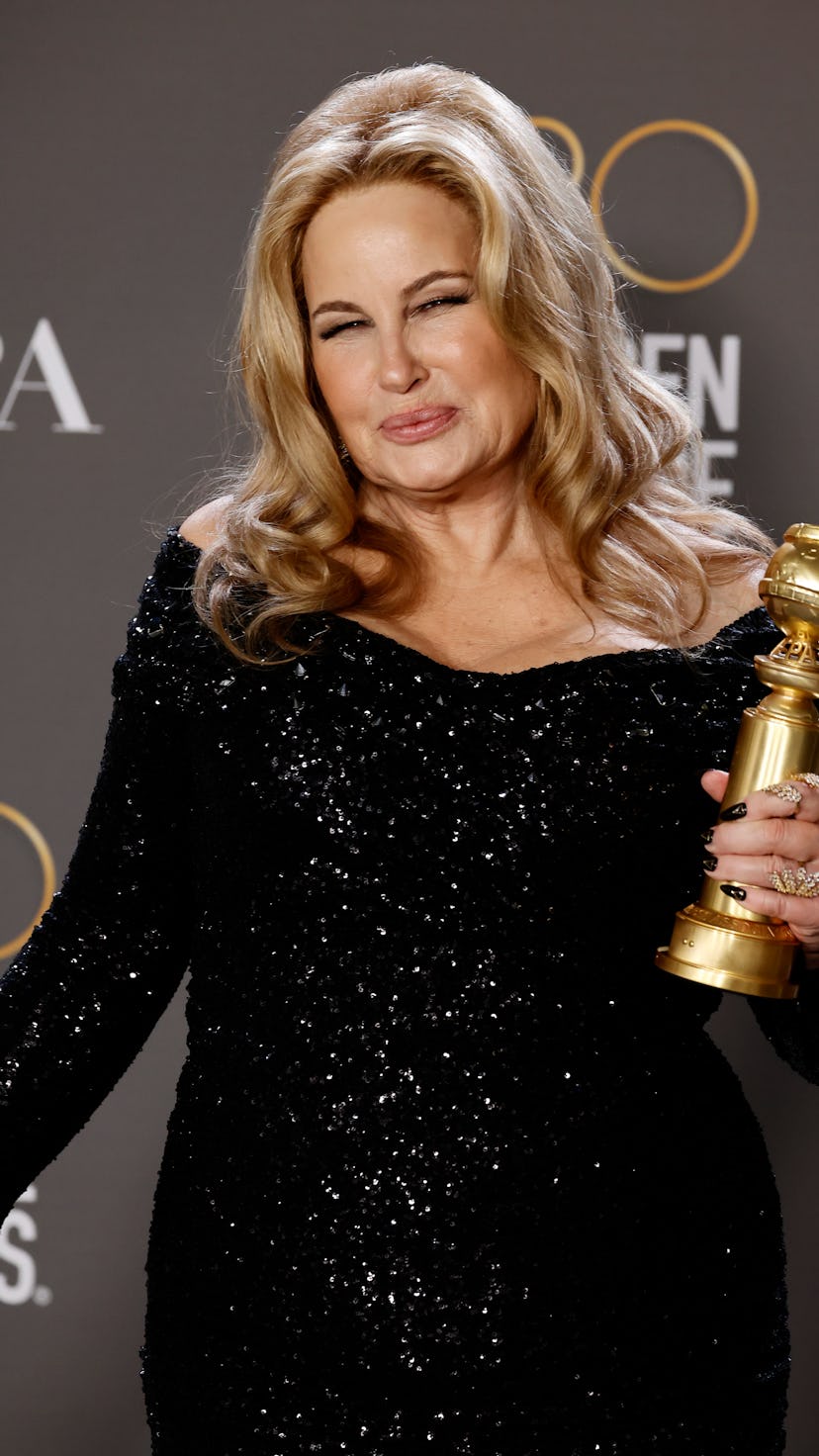 Jennifer Coolidge poses with the Golden Globe for Best Supporting Actress