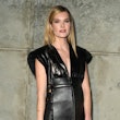 Meghann Fahy wearing a black leather outfit.