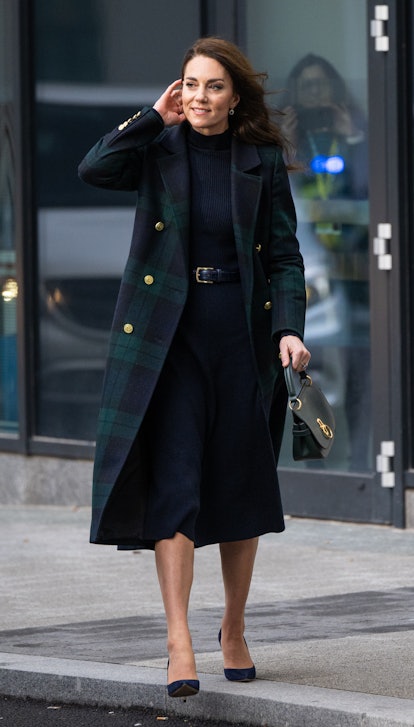 Kate Middleton wearing a plaid coat from Holland Cooper.
