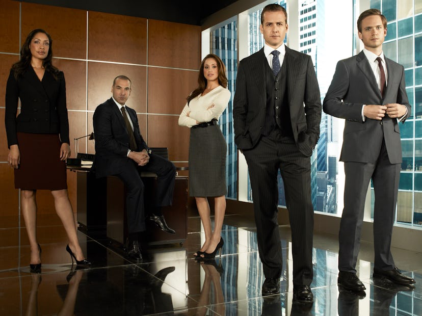 SUITS – Season 1 – Pictured: (l-r) Gina Torres as Jessica Pearson, Rick Hoffmann as Louis Litt, Me…