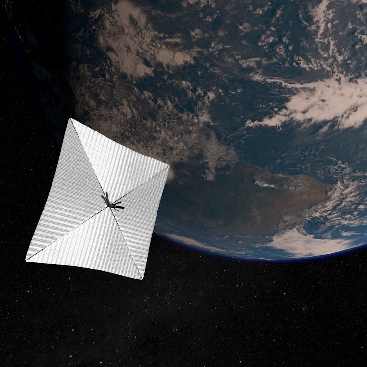 Solar sail and cubesat with Earth in the background.