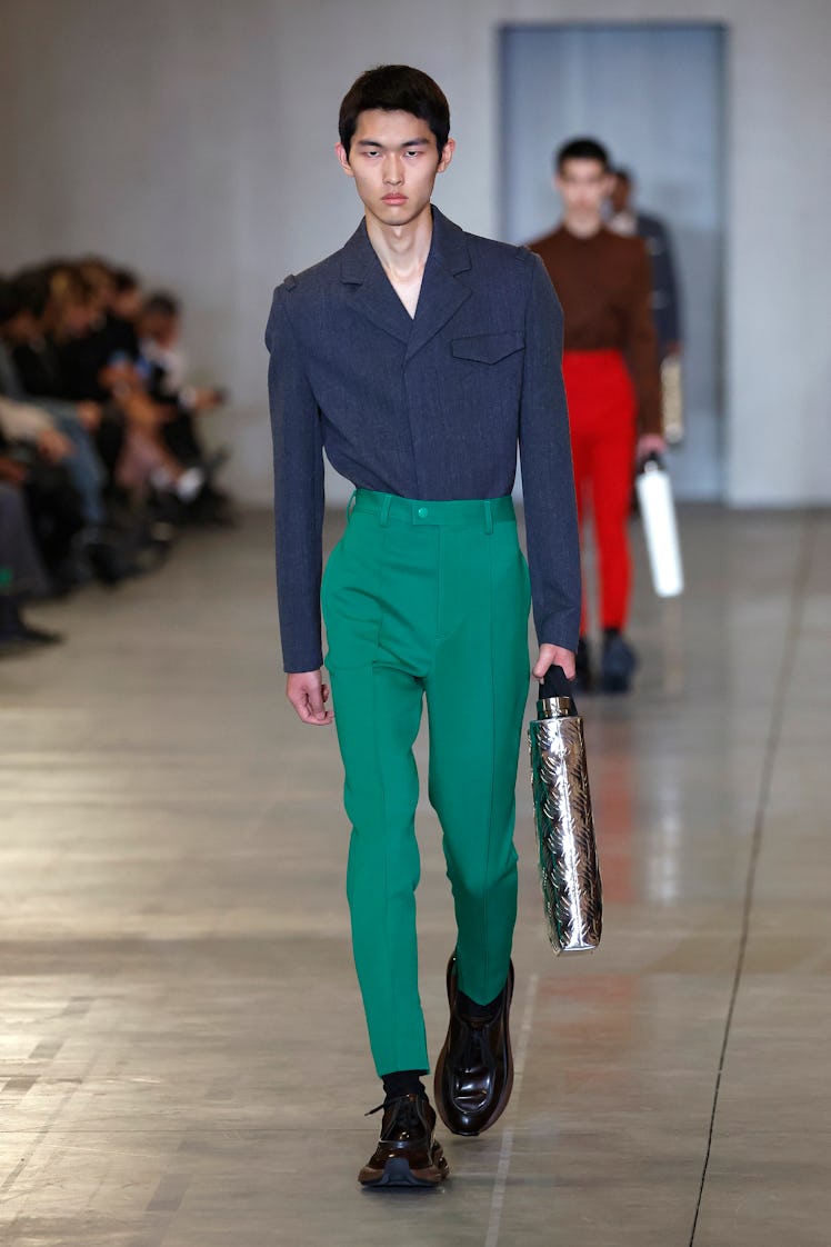 A model walks the runway at the Prada fashion show during the Milan Menswear Fall/Winter 2023/2024 o...