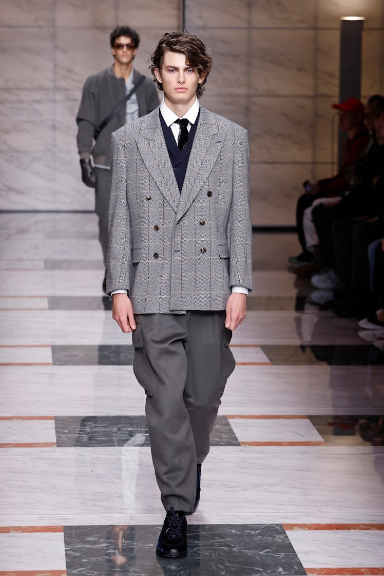 A model walks the runway at the Giorgio Armani fashion show during the Milan Menswear Fall/Winter 20...