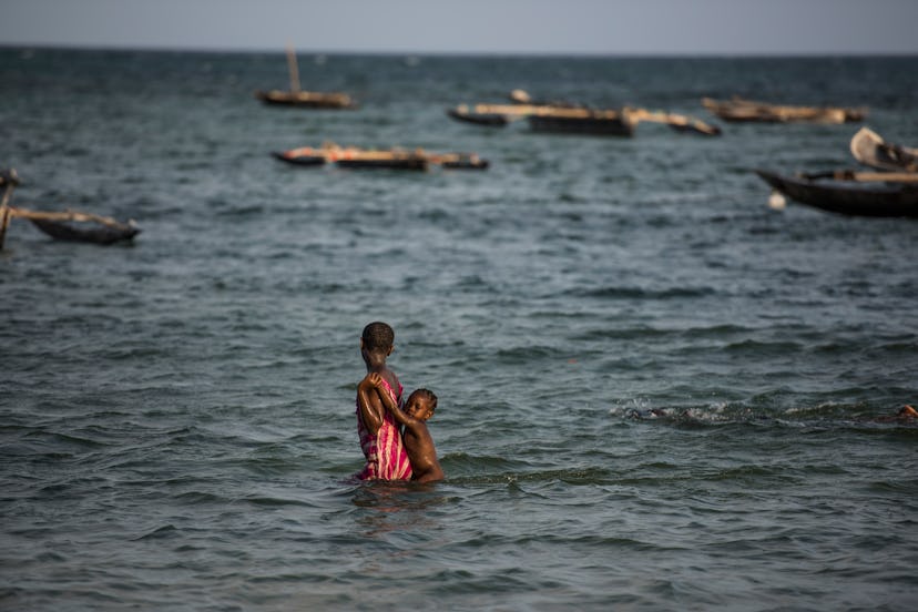 MSAMBWENI, KENYA - 2016: Children local to the small fishing town and constituency of Msambweni pict...