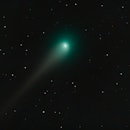 A green comet.