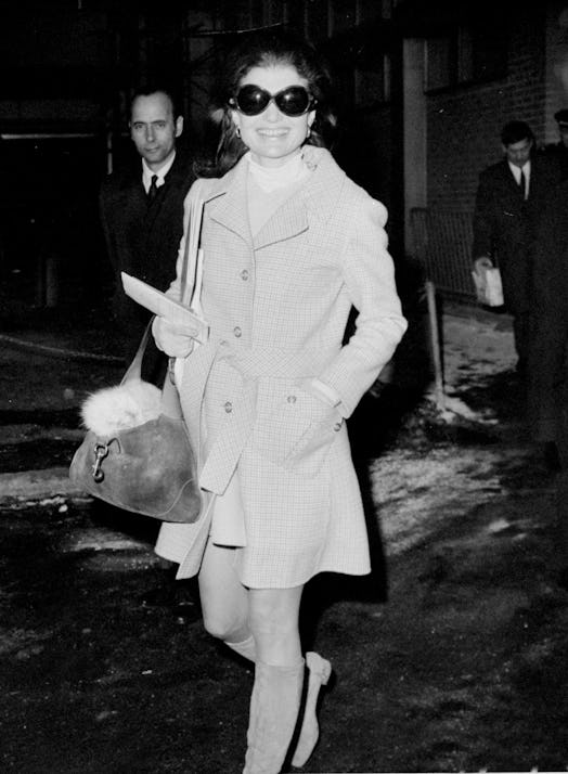 Jacqueline Kennedy Onassis carrying her Gucci bag at Kennedy Airport in the 1970s