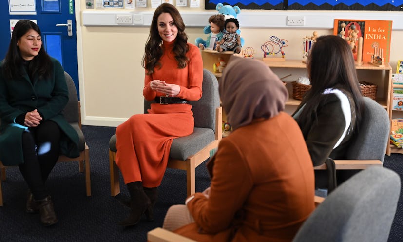 Kate Middleton wearing an orange Gabriela Hearst outfit.