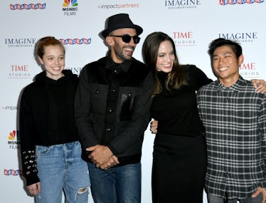 LOS ANGELES, CALIFORNIA - NOVEMBER 18: (L-R) Shiloh Jolie-Pitt, street artist JR, actress Angelina J...