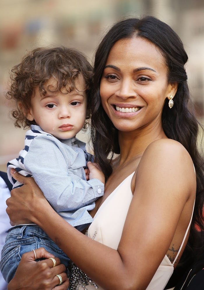 HOLLYWOOD, CA - MAY 03: Zoe Saldana and her youngest son, Zen Perego-Saldana attend the ceremony ho...