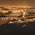 Panorama of Vienna Austria by Night From Above Many Lights and the Danube River Crossing the City Sk...