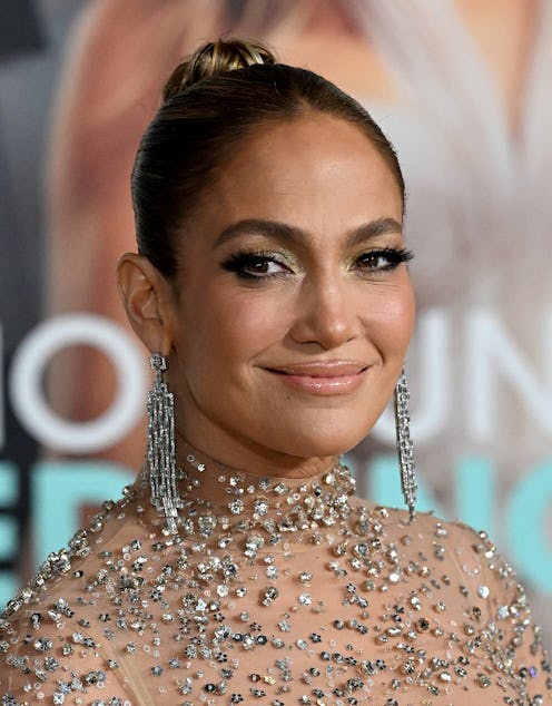 Jennifer Lopez attends the Los Angeles premiere of Prime Video's "Shotgun Wedding" in a rhinestone n...