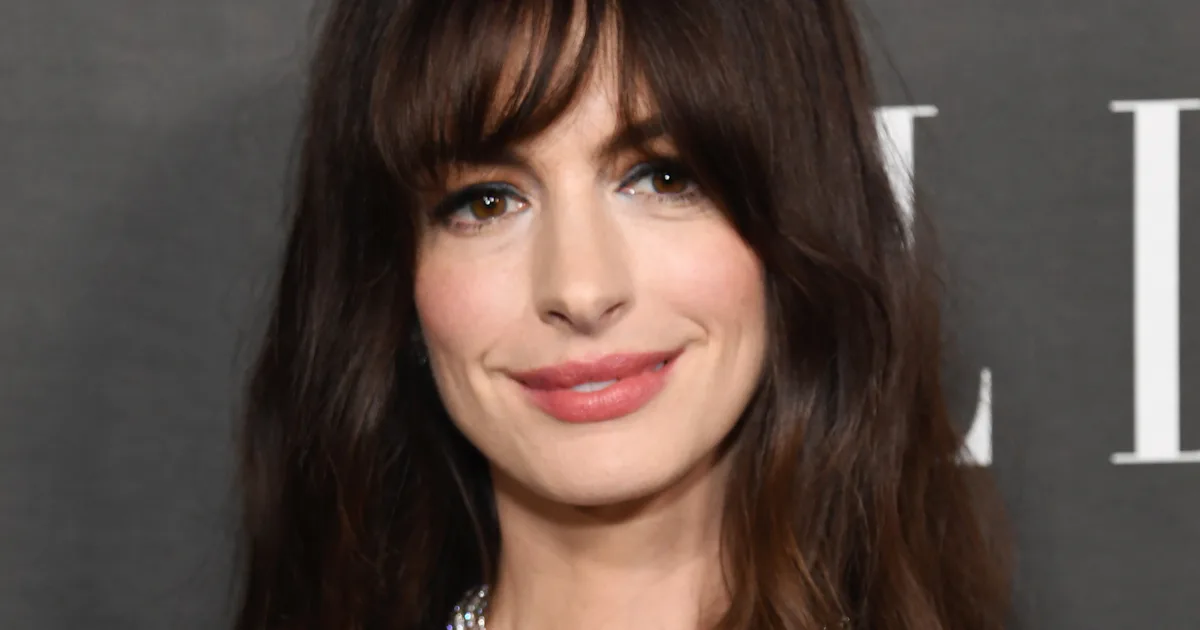 Anne Hathaway Wore A Corset Puffer Coat As A Dress & I Need It In My Closet ASAP