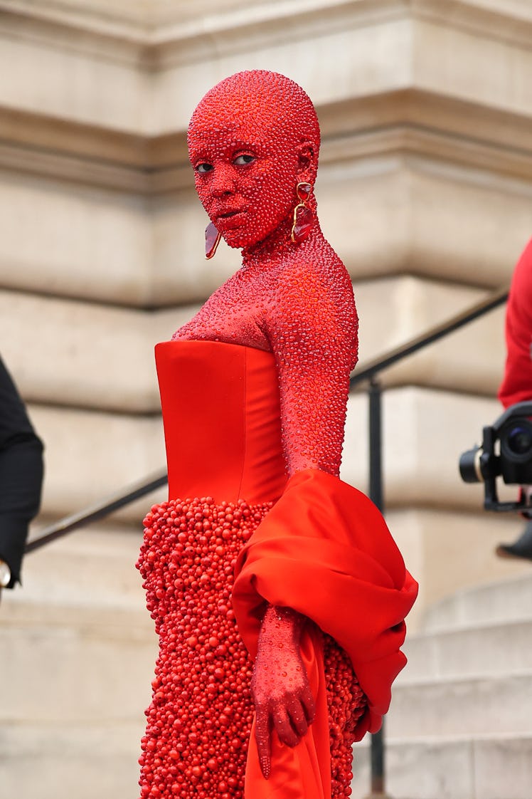 On Jan. 23, Doja Cat made heads turn by appearing at Schiaparelli's fashion show covered in 30,00 cr...