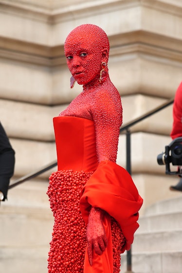 On Jan. 23, Doja Cat made heads turn by appearing at Schiaparelli's fashion show covered in 30,00 cr...