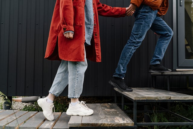 A couple going inside a house after a date