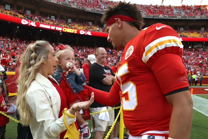 KANSAS CITY, MISSOURI - SEPTEMBER 15: Patrick Mahomes #15 of the Kansas City Chiefs talks his wife, ...