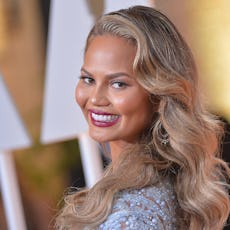 Chrissy Teigen flaunts her post-partum leaky boobs, and we are all here for it. 