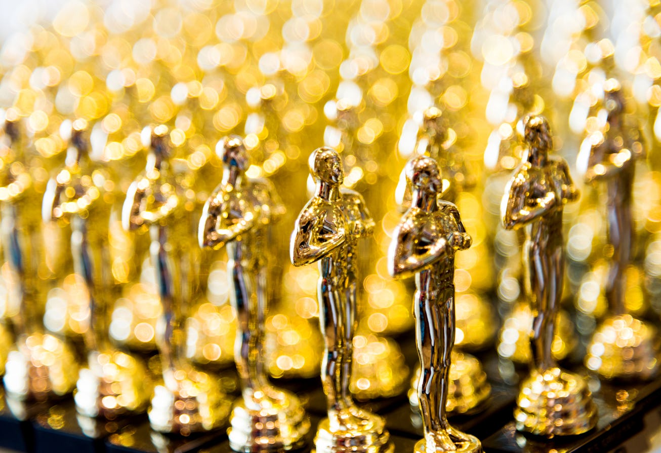 Singapore city, Singapore - January 5, 2016: Large group of Clone/Fake golden award statues in a sho...